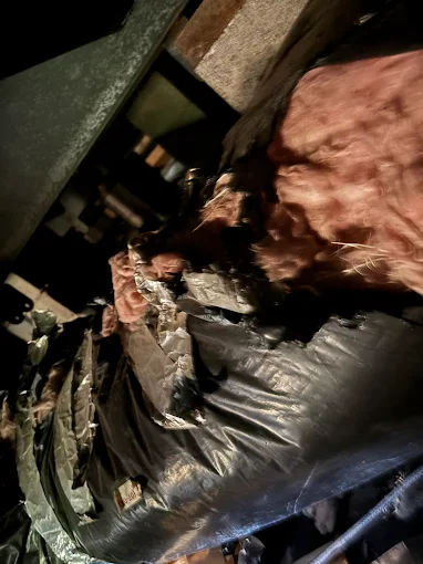 Professional ductwork inspection and AC system diagnosis by DiMartino's certified HVAC technicians DiMartino's HVAC technician inspecting ductwork and HVAC system components in Salem Oregon crawl space during AC repair diagnosis